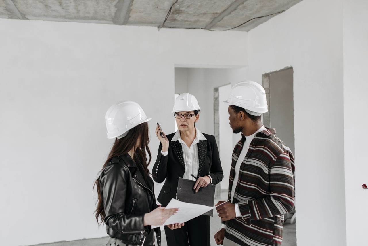Construction team comparing options on site