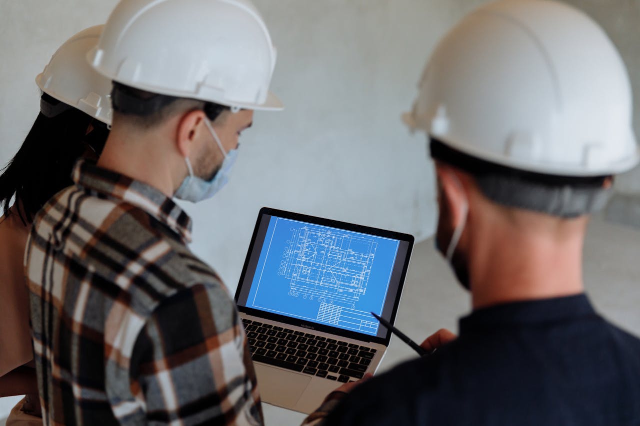 Site engineer using a tablet on an NEC4 project