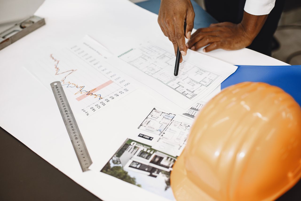 Project manager reviewing construction plans