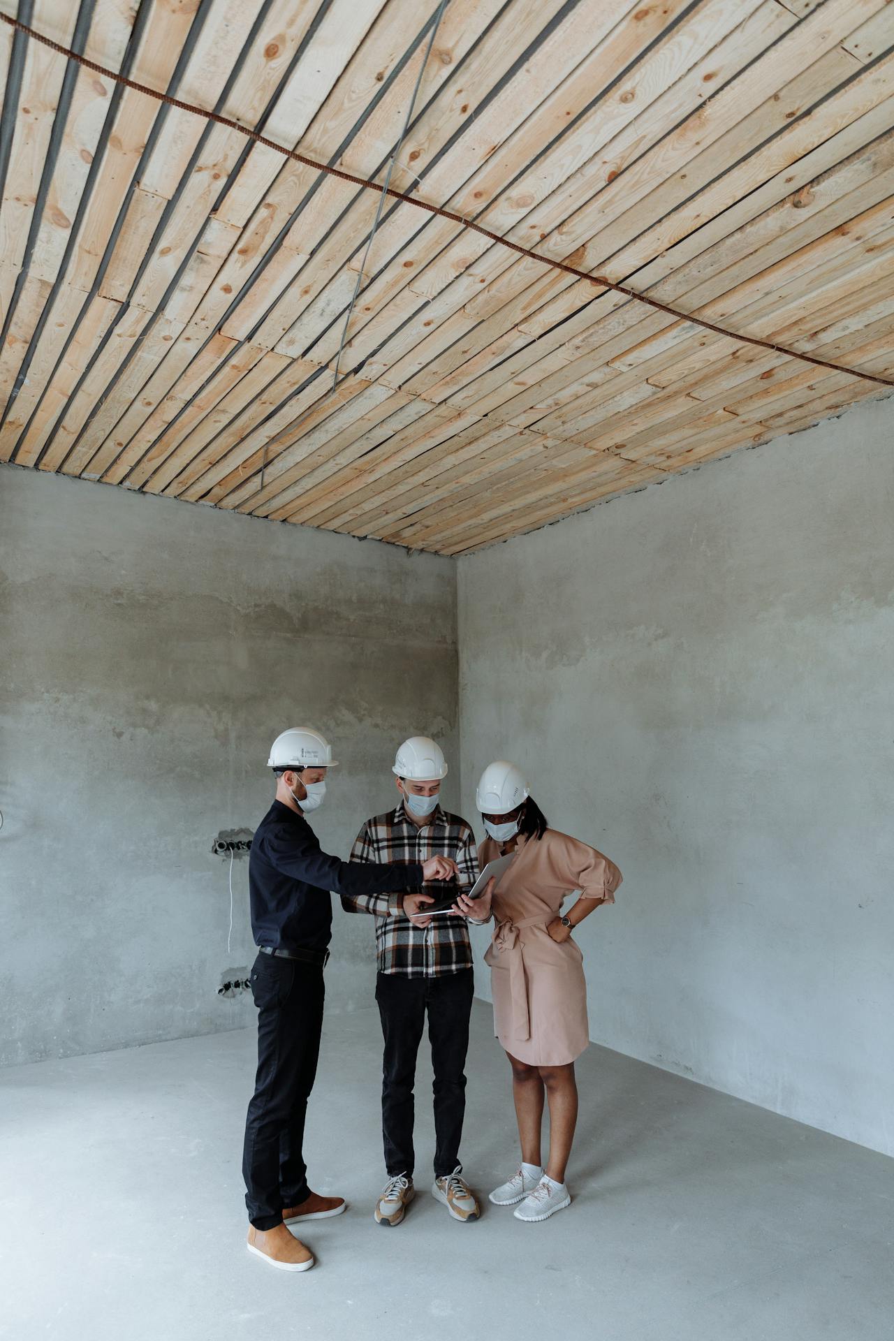 Project team meeting on a construction site